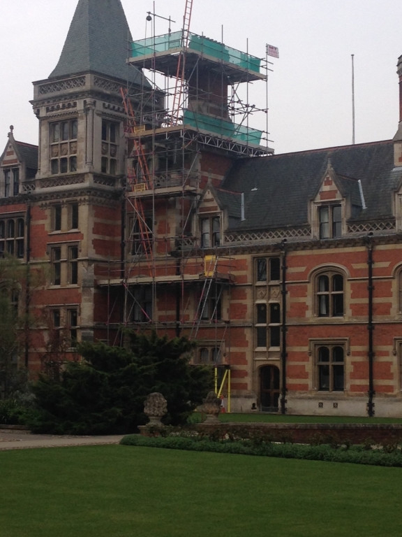 Scaffolding erected around a tower on a historic Cambridge University building